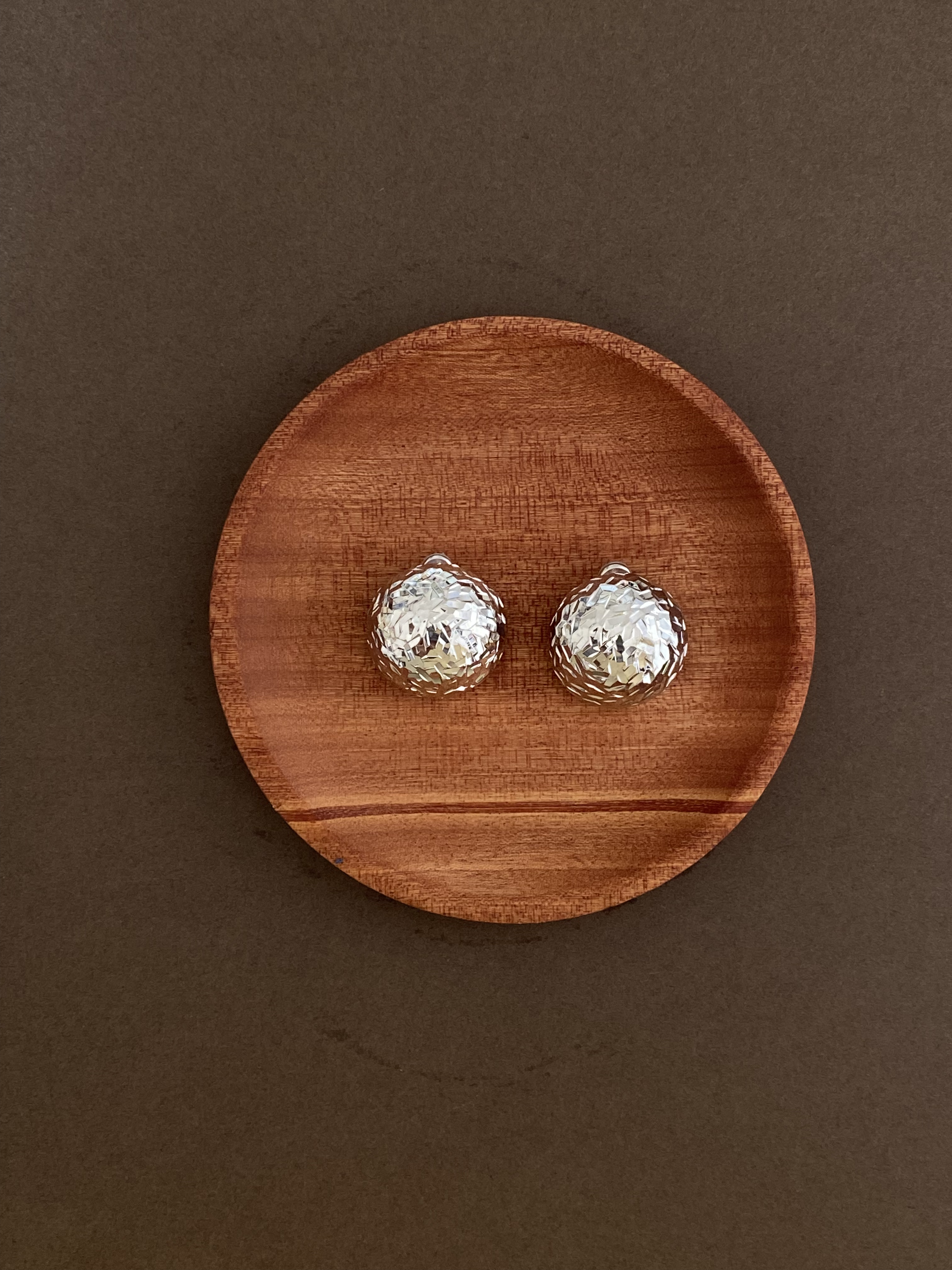 Metal  gleaming  earring