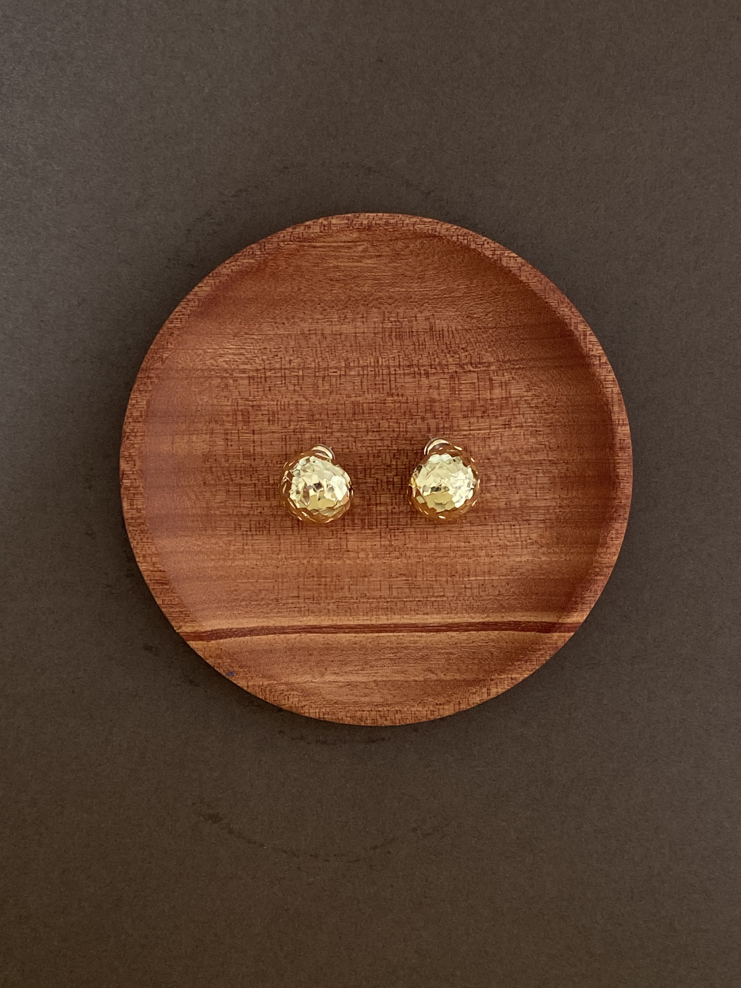 Metal  gleaming  earring