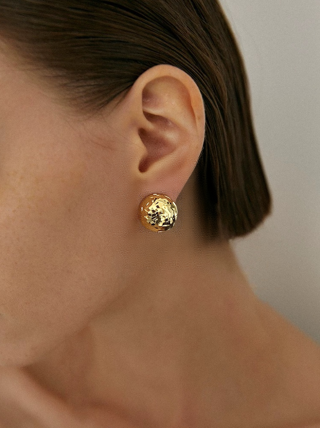 Metal  gleaming  earring